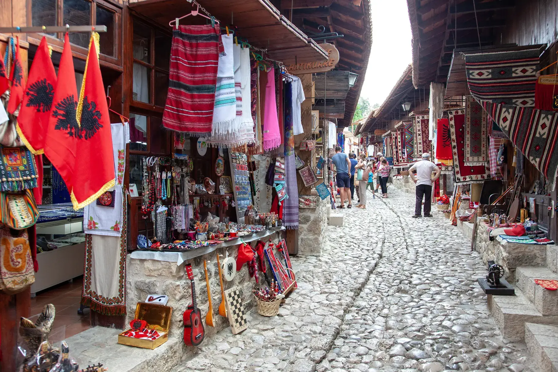 Flags and carpets along the bazaar lane