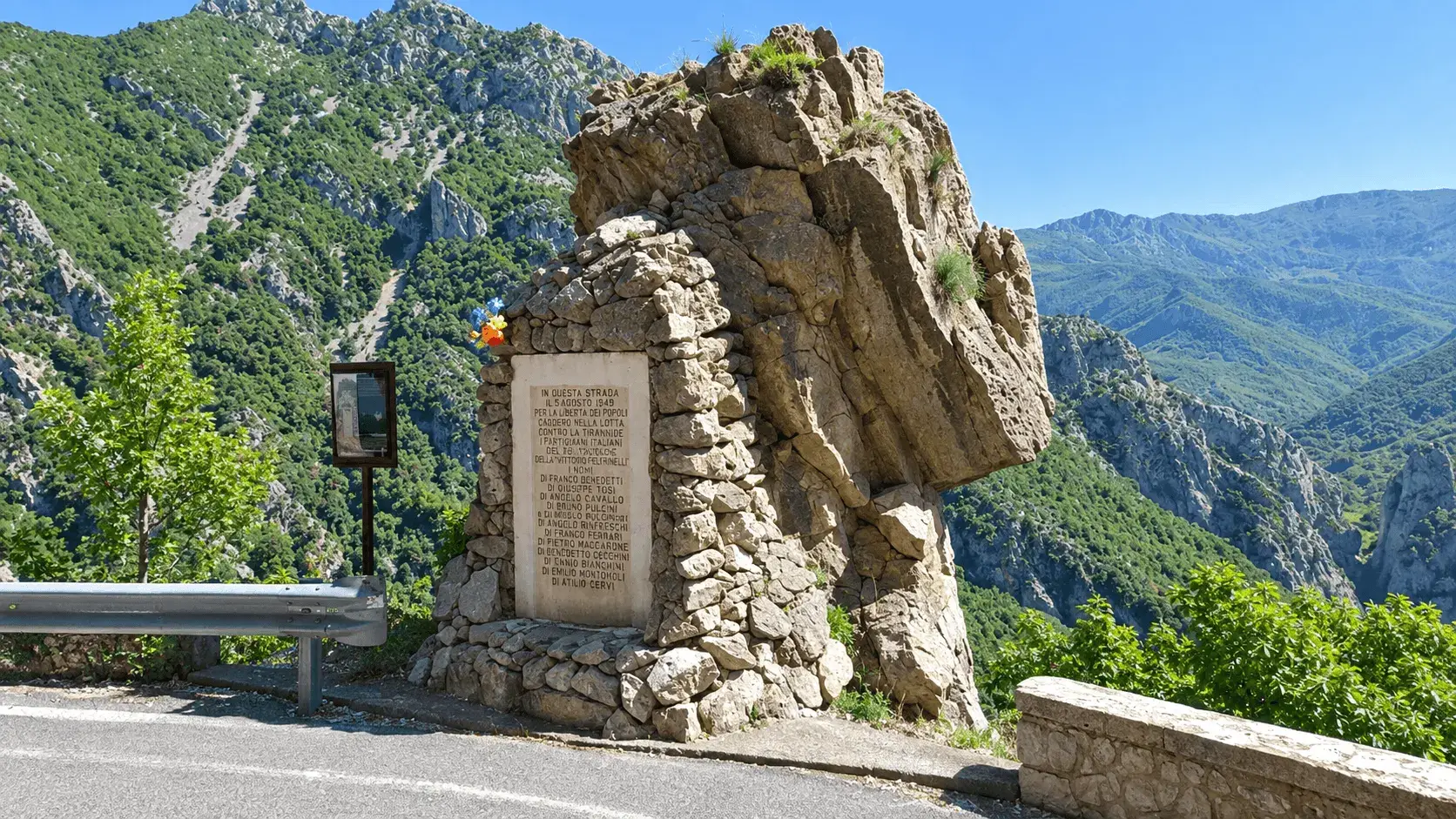 The roadside monument below the rock